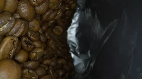 Macro video inside a packet of coffee beans. Stock-Footage 158798096