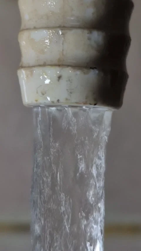 Macro video of an open faucet Stock Footage 314692104