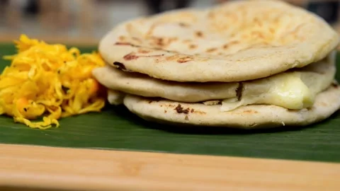 Macro video pans across a typical Central American deli named 'Pupusas,' sh.. Stock-Footage 252339440