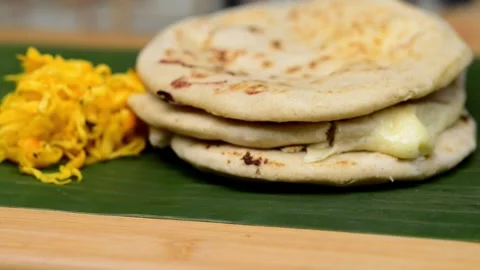 Macro video pans across a typical Central American deli named 'Pupusas,' sh.. Video stock 252339887