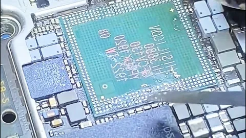 Macro Video of Professional Mobile IC Reballing Process Stock Footage 333360727