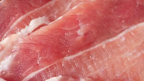 Macro video of raw pork belly slice Stock Footage 245716627