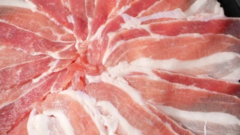 Macro video of raw pork belly slice Stock Footage 245717843
