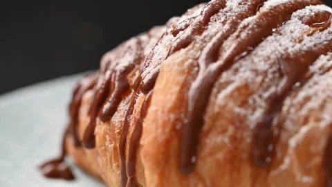 Macro video recording of smooth focus movement on a delicious croissant 스톡 동영상 255948408