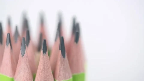 Macro video rotation of graphite pencils in set on a white background. closeup. Stock Footage 247610064