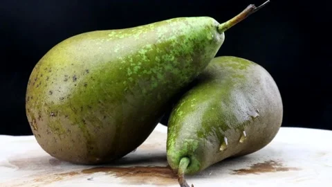 Macro video of two natural pears Stock Footage 262481131