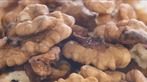 Macro video of walnuts spinning in a circle Stock Footage 253113726