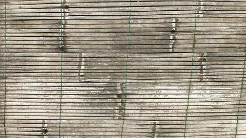 Macro view of aged bamboo wall texture displaying horizontal grain and natu.. Stock-Fotos