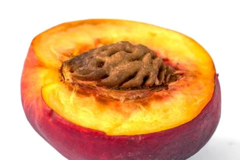 Macro view of appetizing half peach as a wallpaper Stock Photos