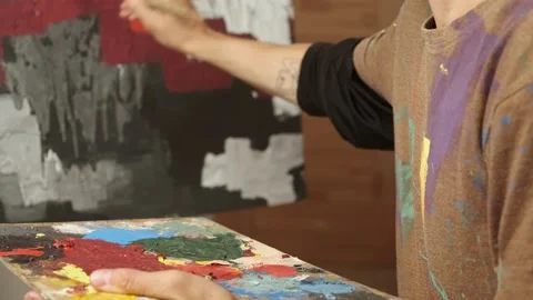 Macro view of artist creating abstract painting, expressive texture with acrylic Stock Footage 312634611