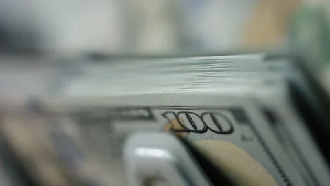 Macro view automatic counting money close up. Counter calculating dollar bills. Video stock 232546571