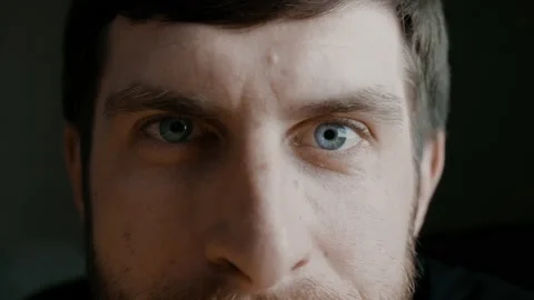 Macro view of bearded man with blue iris eyes that looking at camera. Healthy Stock Footage 136473491