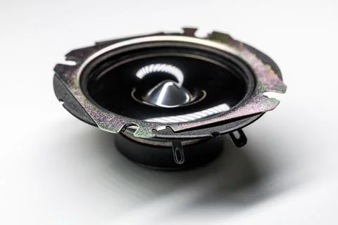 Macro view of a black speaker driver with a reflective cone Stock Photos