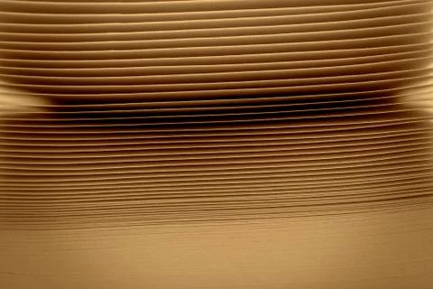 Macro view of book pages, as a background, vintage colored background. Stock Photos