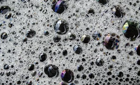 Macro view of bubbles forming on the water surface Stock Photos