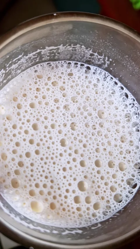 Macro View of Bubbles in a Frothy Liquid Top Down Stock Footage 321645963