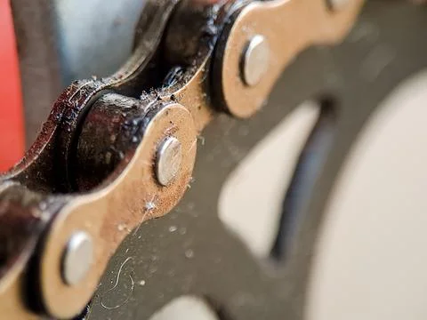 Macro view captures the intricate details of a bicycle chain, showcasing it.. Stock Photos
