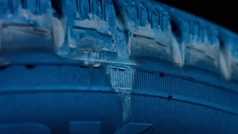 Macro view of car rubber tire. Car details presentation in slowmotion Stock Footage 143800936