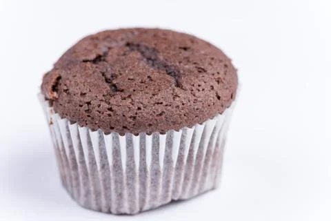 Macro view of chocolate muffin over white Foto stock