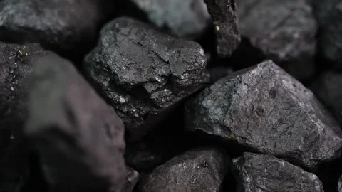 Macro view of coal pieces moving slowly in front of the camera. A striking .. Stock Footage 302219071