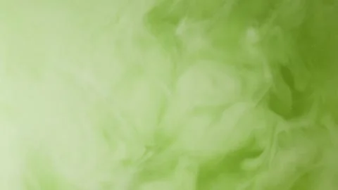 Macro view of coconut milk blending with green matcha tea Stock Footage 345681744
