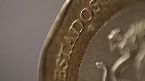 Macro View of Coin Edge Showing Engraved Lettering and Metallic Texture Stock Footage 338413382