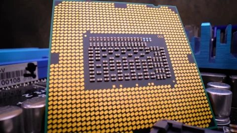 Macro view of computer cpu processor pins on motherboard with cinematic sli.. Stock-Footage 337337137