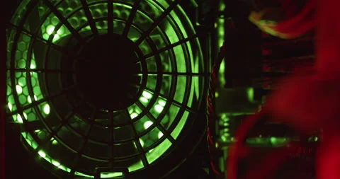 Macro view Computer interior cooling fan start up and Shutdown. Stock Footage 145105602