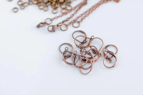 Macro view copper earring hooks. Craft supplies. Stock Photos