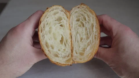 Macro View of Croissant Layers and Open Crumb Structure Stock Footage 306758734