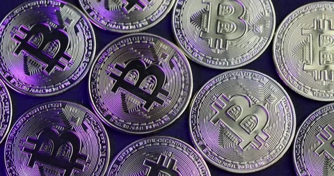 Macro view of Crypto Coins while rotating. 4K Video Stock Footage 166799364