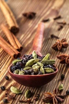 Macro view of the different spices on table Stock Photos
