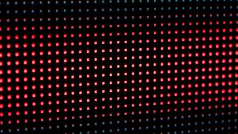 Macro View of a Digital LED Panel with RGB Pixel Grid Foto stock