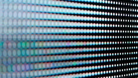 Macro View of a Digital LED Panel with RGB Pixel Grid Foto stock