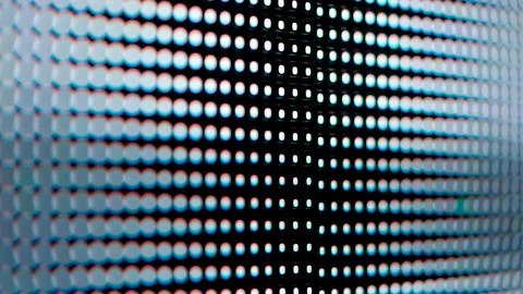 Macro View of a Digital LED Panel with RGB Pixel Grid Stock Photos