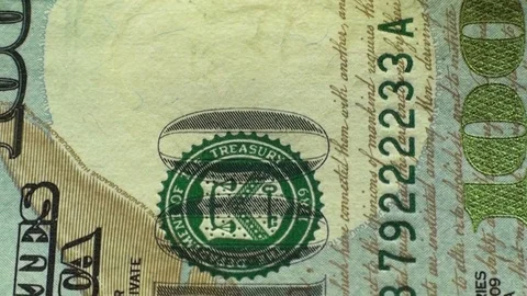 Macro view of dollar bill and coin of one dollar. Camera movement on a banknote. Stock Footage 79782843