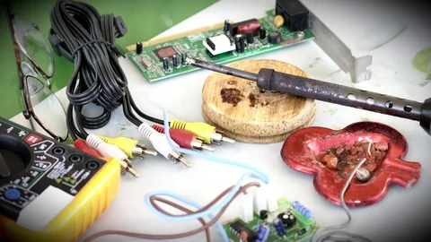 Macro view  electronics technician workplace. Time lapse Stock Footage 76971383