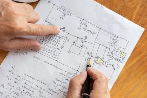 Macro view of engineer planing the electrical circuit on papers Stock Photos