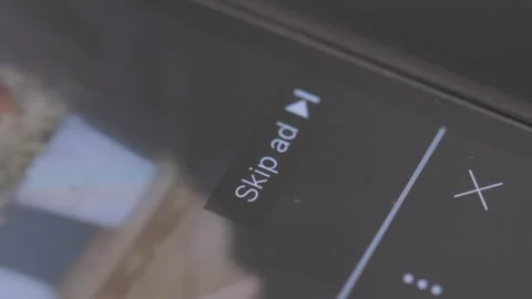 Macro view of a finger skipping Ad on Youtube Stock Footage 240929430