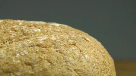 Macro View of Freshly Baked Bread on Grey Background, Slider Video stock 76521854