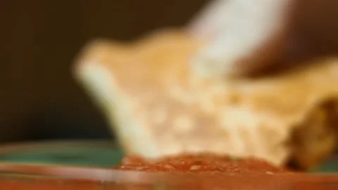 Macro view of freshly fried hot vegetable quesadilla with salsa on a wooden Stock Footage 151295556