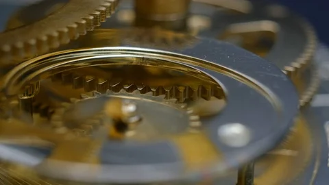 Macro view: Gear mechanism in motion. 4k Видео 102895114