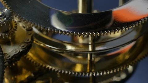 Macro view: Gear mechanism in motion. 4k Видео 102895276