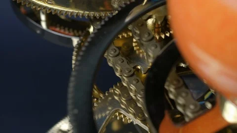 Macro view: Gear mechanism in motion. 4k Stockbeeldmateriaal 102895873