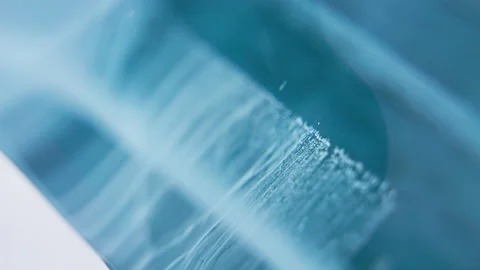 Macro view of glacial clear blue ice pattern. Close up detailed tracking shoot. Vidéo 165148065