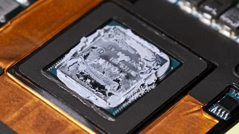 Macro View of a GPU Chip with Old Thermal Paste Zooming In Video stock 313861090