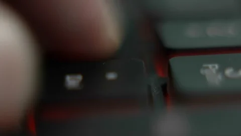 Macro view of hands typing fast on a computer keyboard. English keyboard with Vídeo Stock 105653750