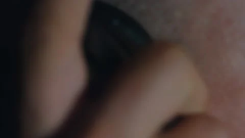 Macro view of handsome male rap singer putting headphones on his head preparing Stock Footage 143726550