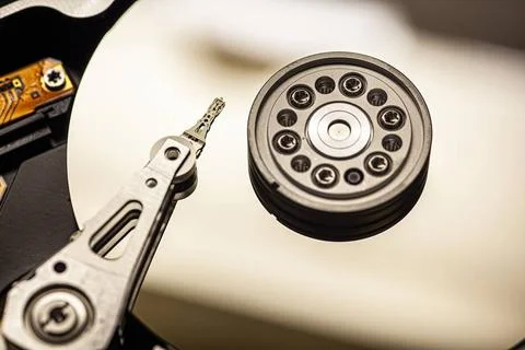  Macro view of a hard disk drive, showcasing its internal components and d... Stock Photos