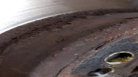 Macro view of a heavily rusted car brake rotor disc Stock Footage 336004927